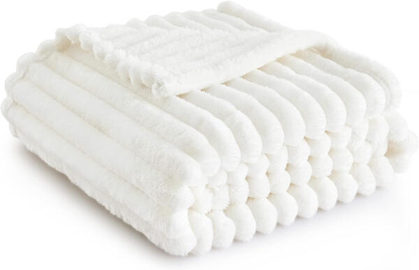 Wrap yourself in this ultra-soft, reversible blanket—perfect for chilly evenings or adding a cozy touch to your decor.